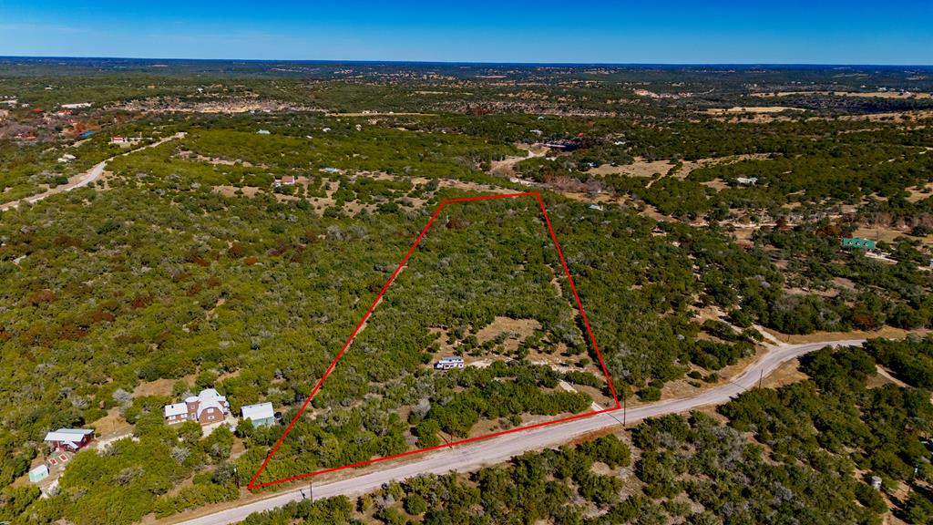 a view of city with ocean