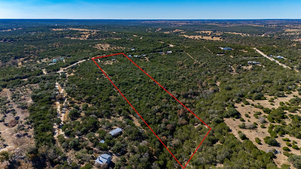 635 Fallow Run Hunt, TX 78024 - Photo 20 of 20 an aerial view of residential houses with outdoor space and trees