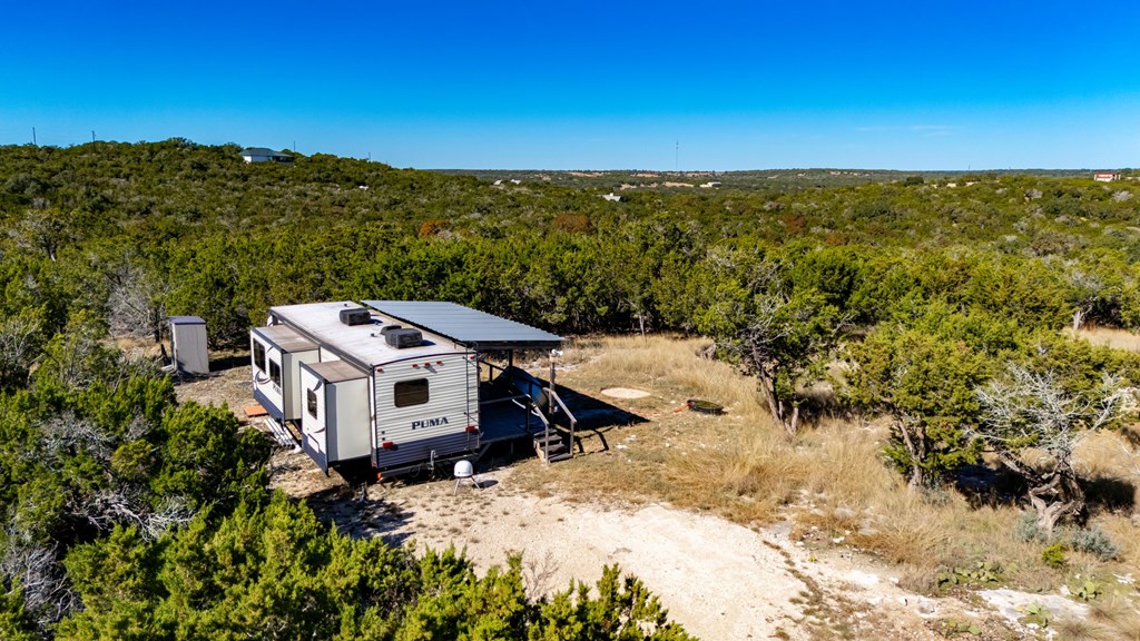 635 Fallow Run Hunt, TX 78024 - Photo 5 of 20 a view of a house with a yard