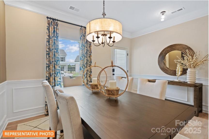 6416 Busch Way Locust, NC 28097 - Photo 5 of 25 a view of a dining room with furniture
