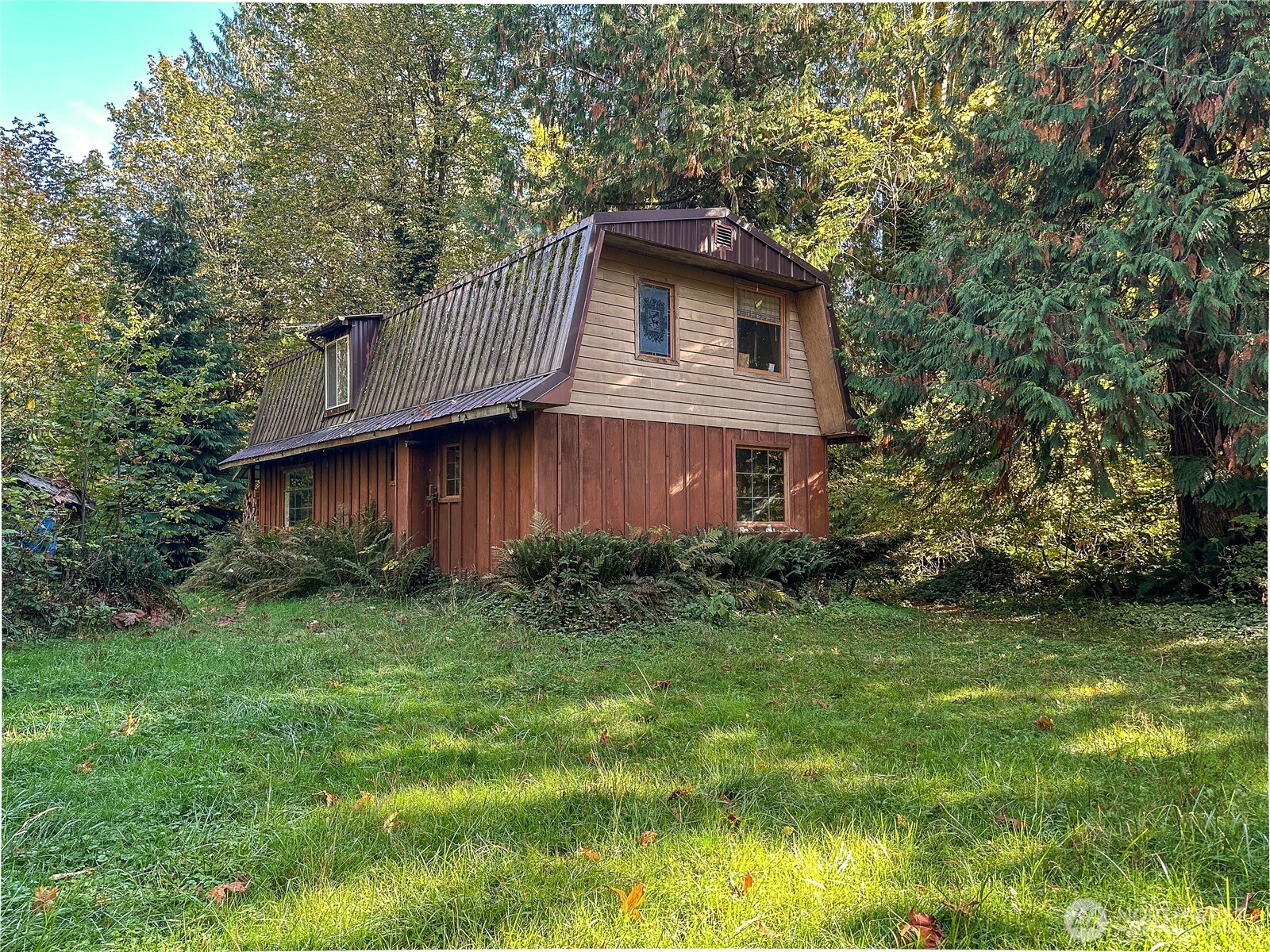 490 West Maple Rock Road Matlock, WA 98560 - Photo 1 of 20 a view of a house with a yard