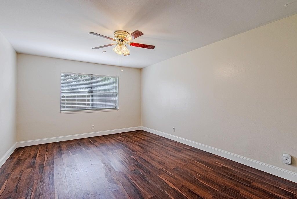 17811 Hawk Haven Lane Spring, TX 77379 - Photo 14 of 22 Another angle of the primary bedroom showcasing its generous space, natural light, and cohesive finishes.