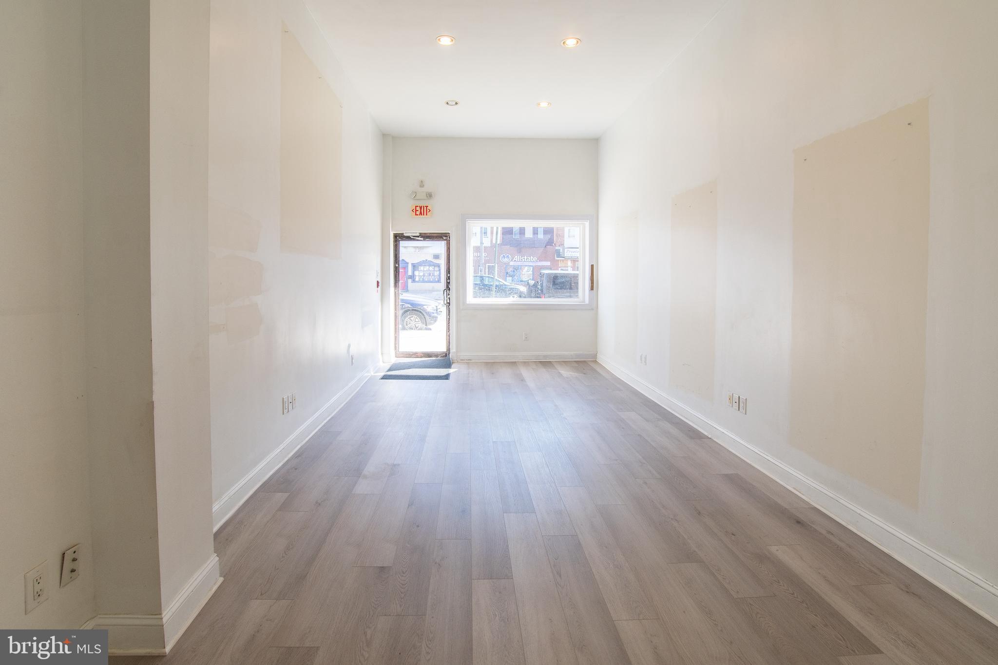 2504 South Broad Street, Unit COMMERCIAL Philadelphia, PA 19145 - Photo 5 of 11 a view of a hallway with wooden floor