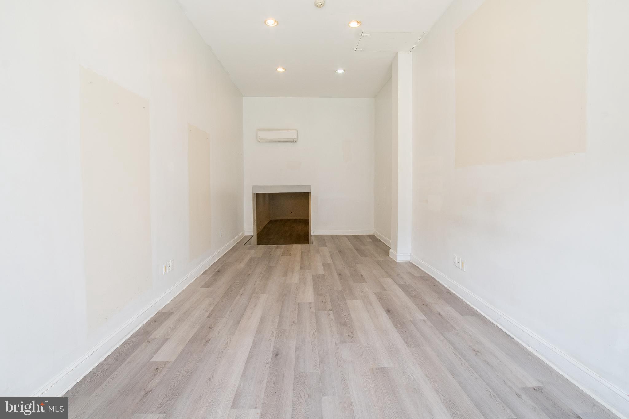 2504 South Broad Street, Unit COMMERCIAL Philadelphia, PA 19145 - Photo 6 of 11 a view of empty room with wooden floor