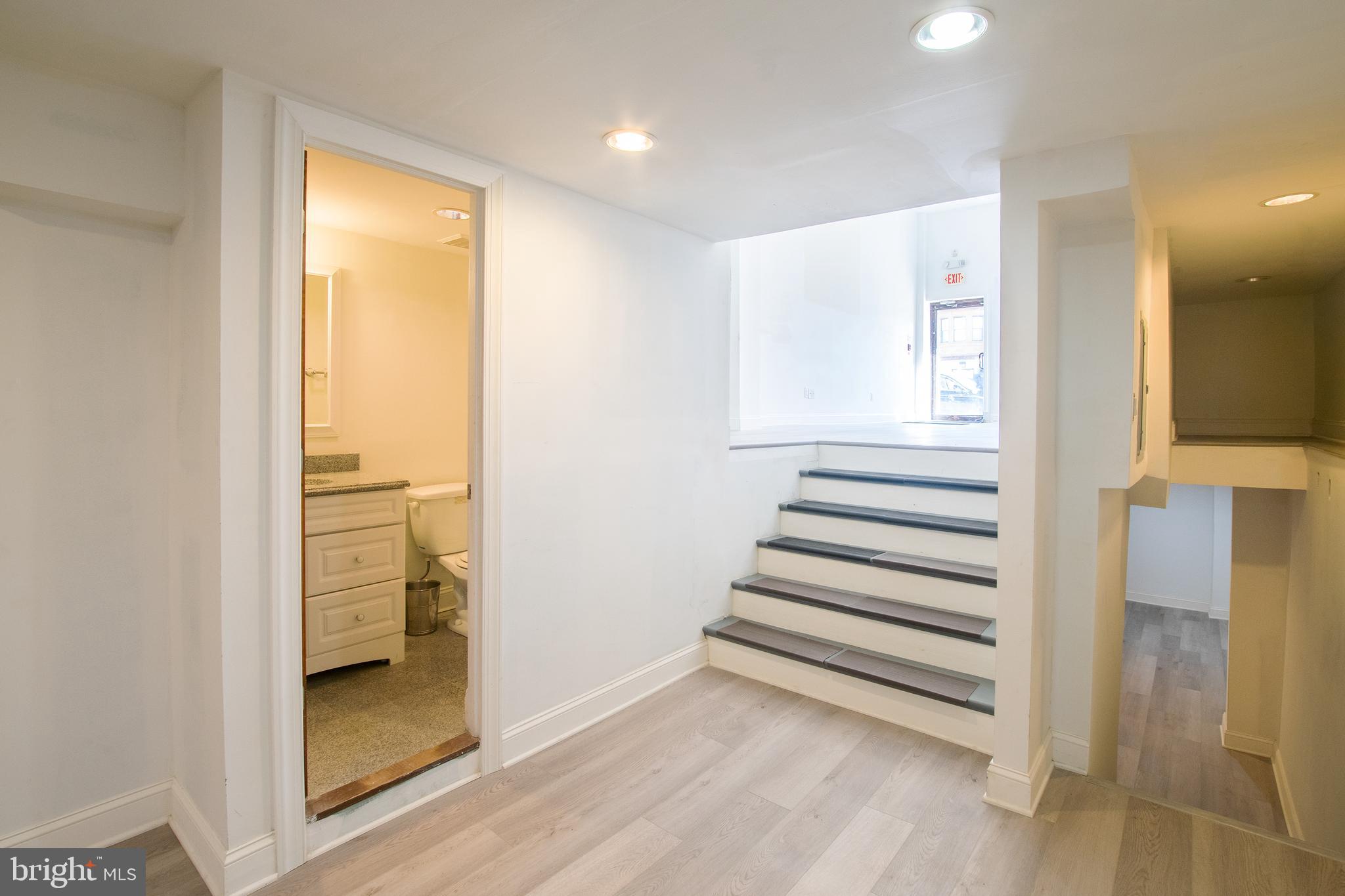 2504 South Broad Street, Unit COMMERCIAL Philadelphia, PA 19145 - Photo 9 of 11 a view of a hallway with entryway wooden cabinet and front door