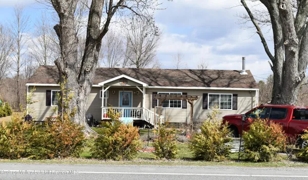 front view of house with a yard