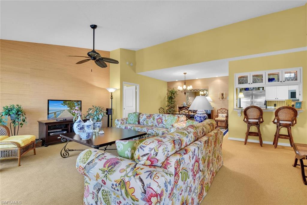 780 Willowbrook Drive, Unit 707 Naples, FL 34108 - Photo 6 of 36 a very nice looking dining room with a table and chairs