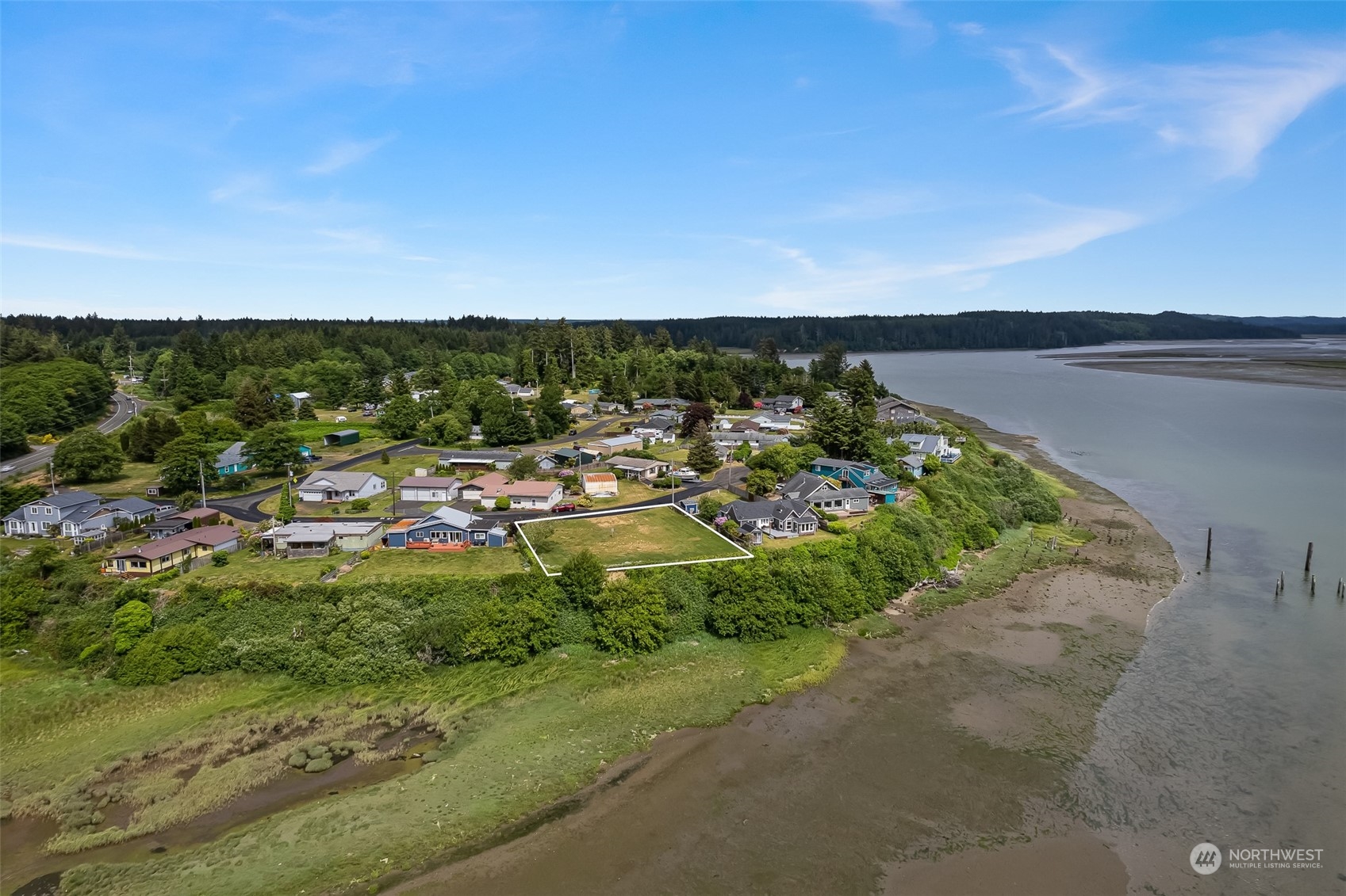 16 Whalebone Way Aberdeen, WA 98520 - Photo 7 of 7 a view of a lake with a house