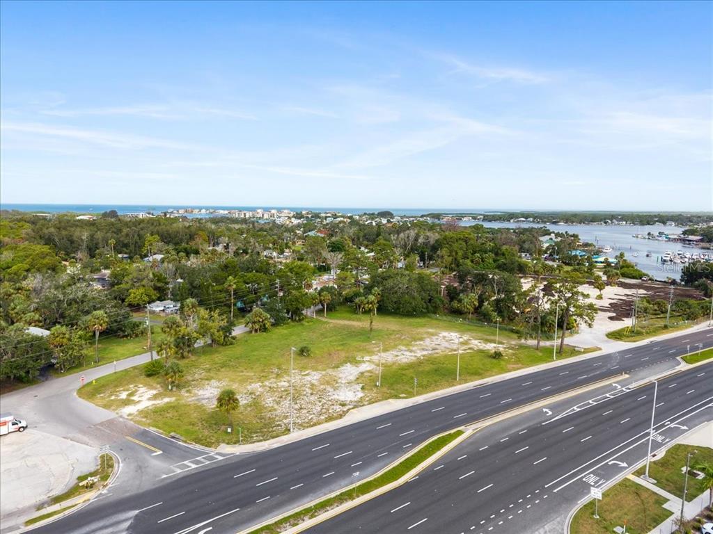 Pier Road New Port Richey, FL 34652 - Photo 11 of 17 a view of a swimming pool with an ocean view