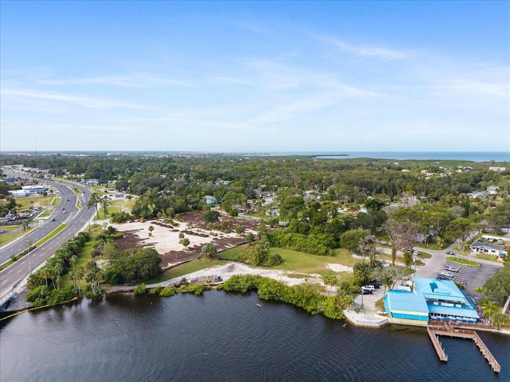 Pier Road New Port Richey, FL 34652 - Photo 13 of 17 an aerial view of residential houses with outdoor space and trees
