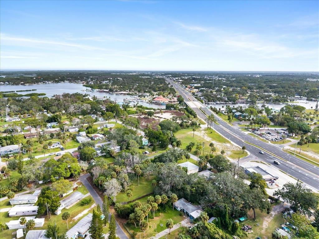 Pier Road New Port Richey, FL 34652 - Photo 16 of 17 an aerial view of residential building and trees around