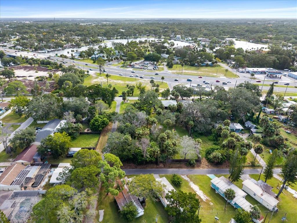 Pier Road New Port Richey, FL 34652 - Photo 9 of 17 a view of a lake with a city
