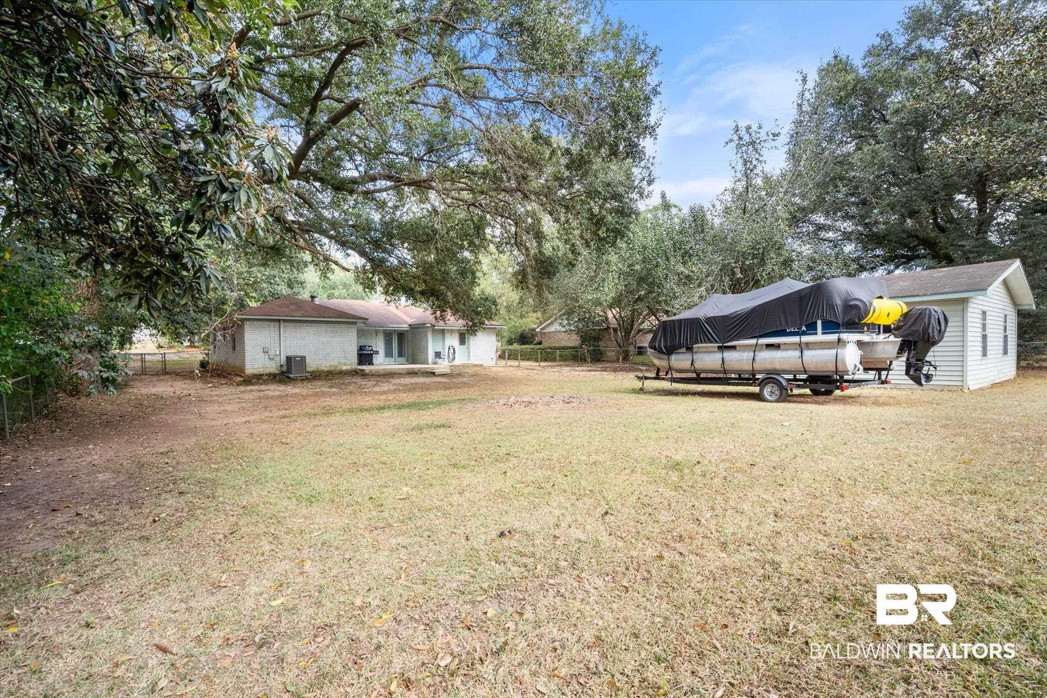 9987 Downing Street Semmes, AL 36575 - Photo 17 of 20 View of yard with a shed