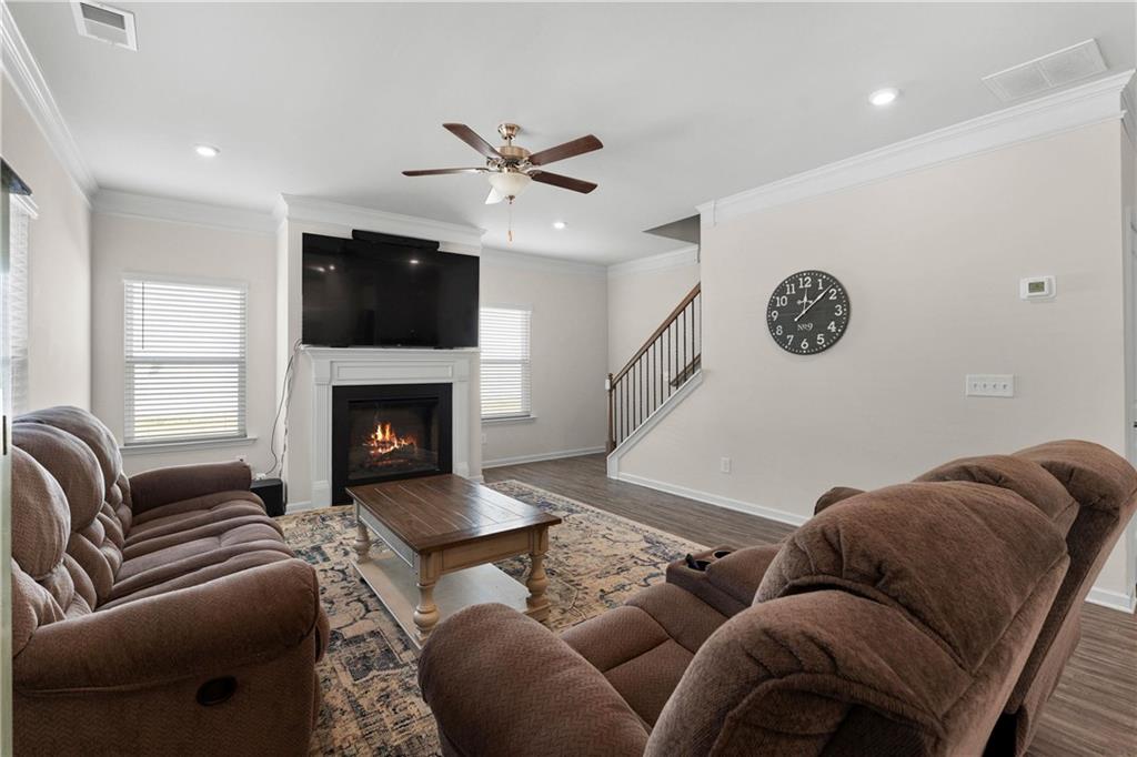 49 Thacker Trail Adairsville, GA 30103 - Photo 14 of 40 a living room with furniture and a fireplace