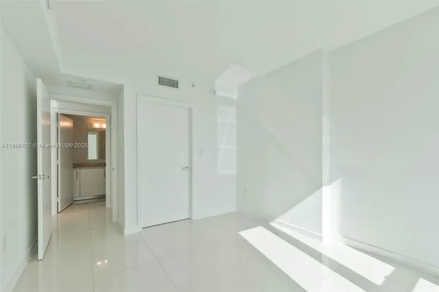 a view of entryway with bathroom