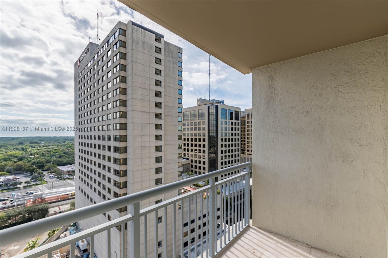 9055 Southwest 73rd Court, Unit 1402 Miami, FL 33156 - Photo 19 of 31 a view of balcony with a couple of buildings