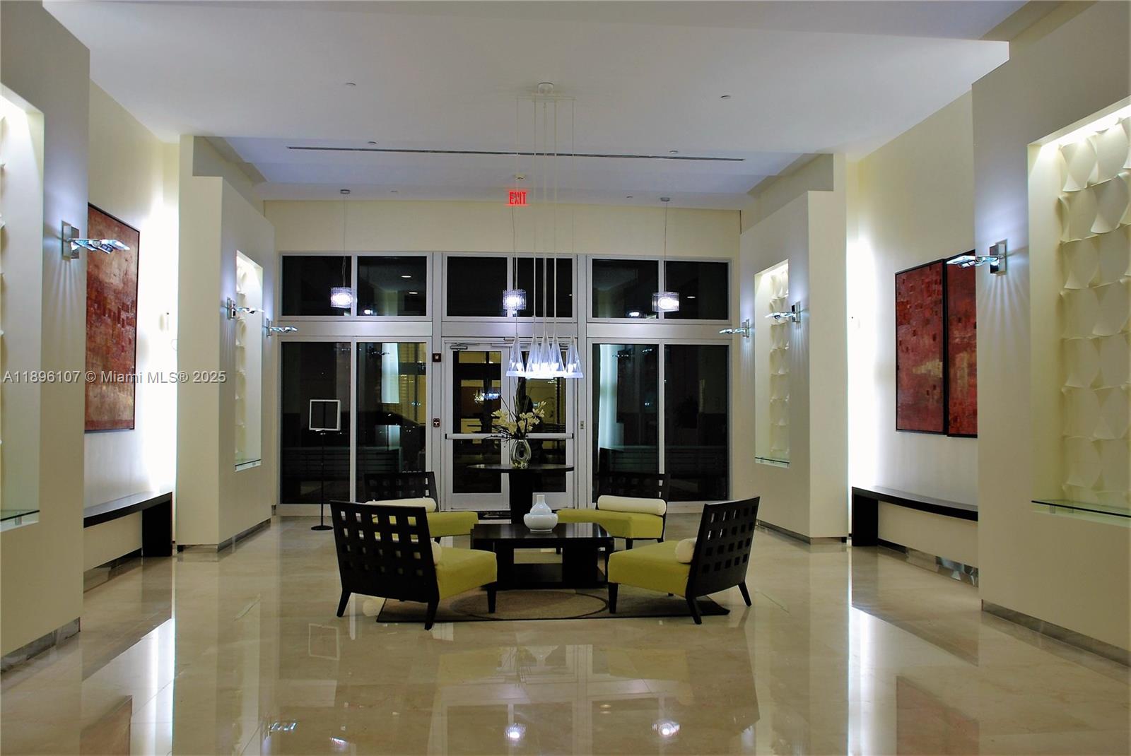 9055 Southwest 73rd Court, Unit 1402 Miami, FL 33156 - Photo 22 of 31 a living room with furniture