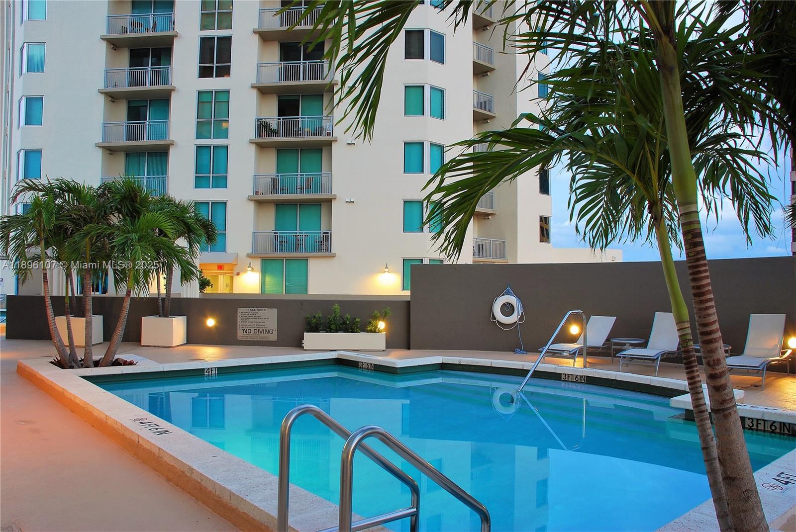 9055 Southwest 73rd Court, Unit 1402 Miami, FL 33156 - Photo 26 of 31 a view of outdoor space with seating area and barbeque oven