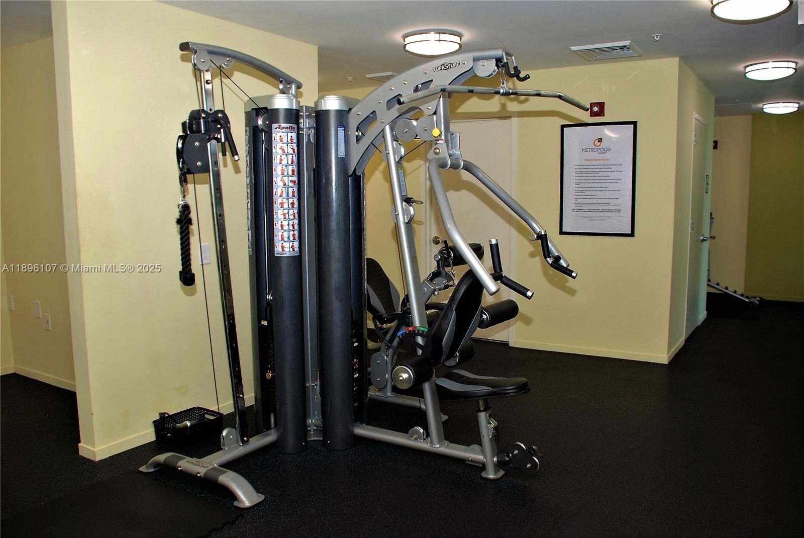 9055 Southwest 73rd Court, Unit 1402 Miami, FL 33156 - Photo 30 of 31 a view of a room with gym equipment