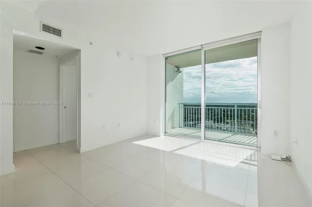 a bathroom with a vanity and a shower