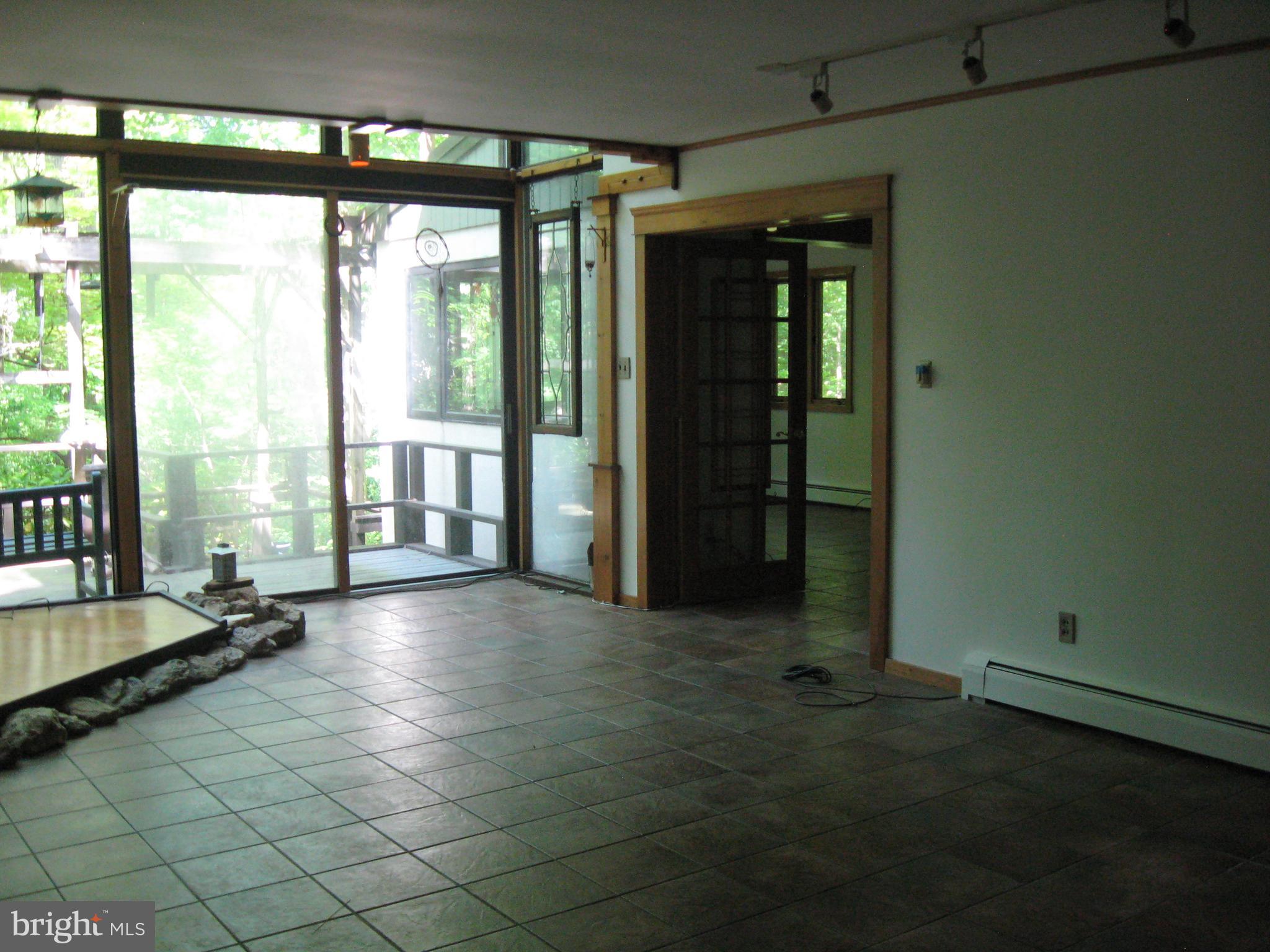 101 Pugh Road Wayne, PA 19087 - Photo 17 of 22 View from Familyroom to outside deck