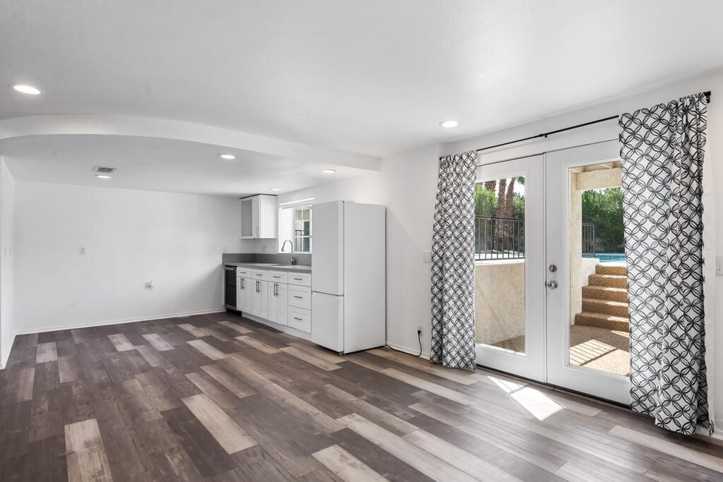 68515 Risueno Road Cathedral City, CA 92234 - Photo 17 of 29 a view of a kitchen with wooden floor and electronic appliances