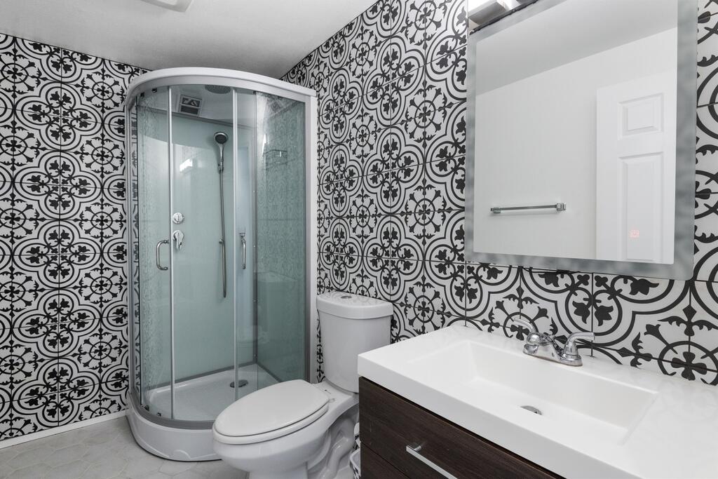 68515 Risueno Road Cathedral City, CA 92234 - Photo 19 of 29 a bathroom with a sink toilet and shower