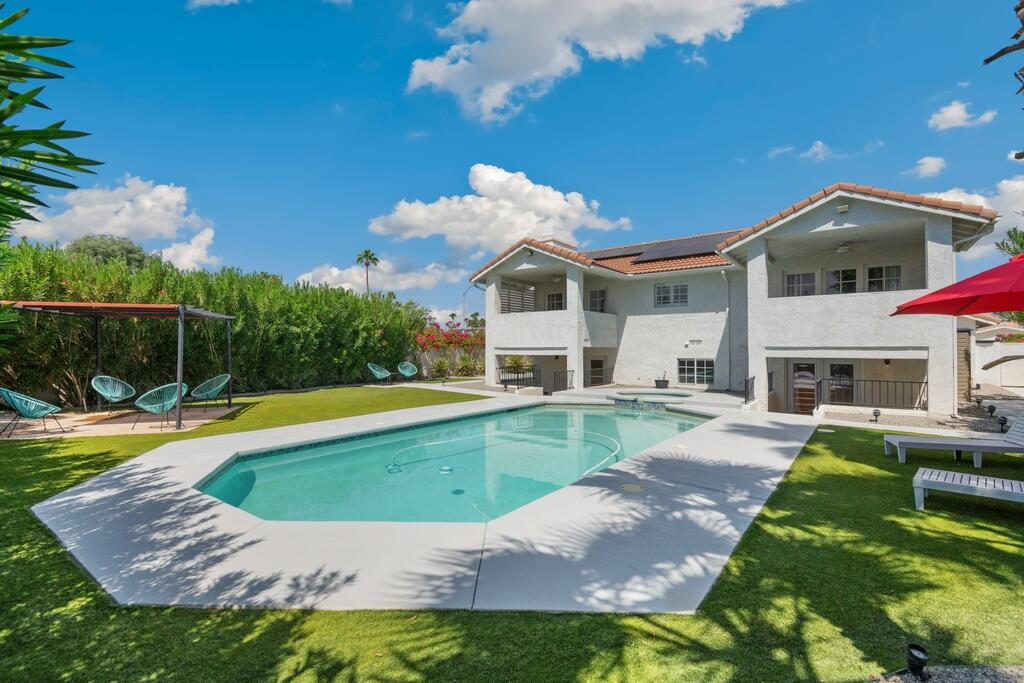 68515 Risueno Road Cathedral City, CA 92234 - Photo 2 of 29 a view of a house with swimming pool