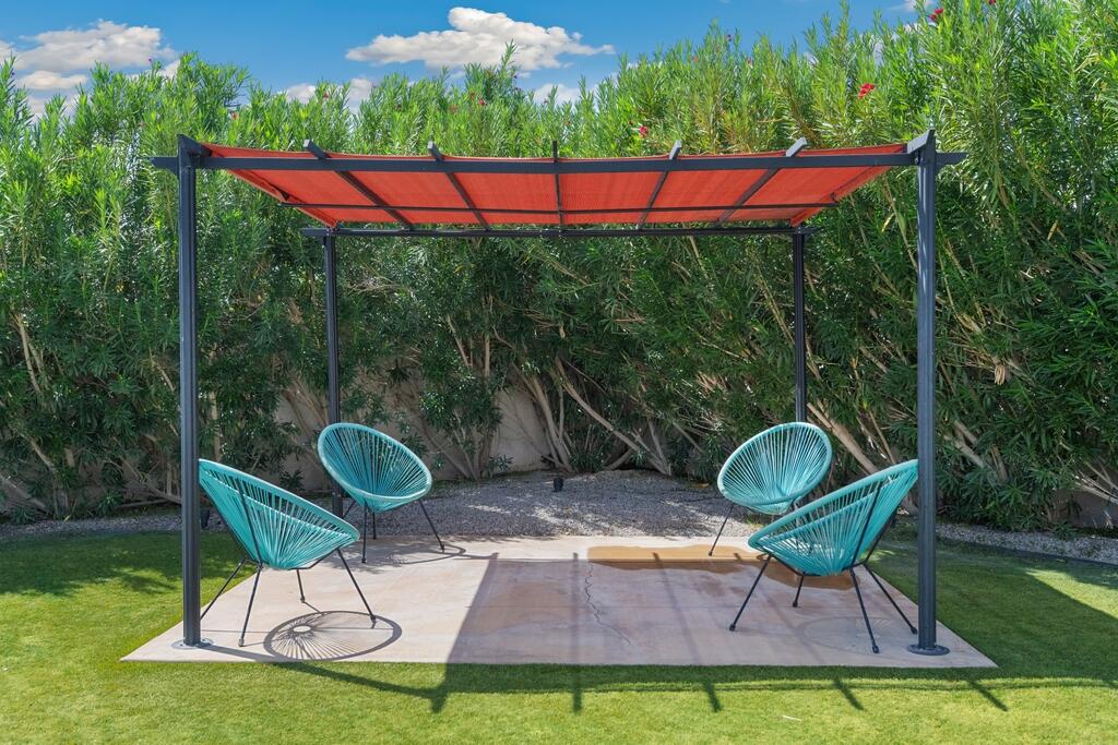 68515 Risueno Road Cathedral City, CA 92234 - Photo 27 of 29 a garden view with a seating space