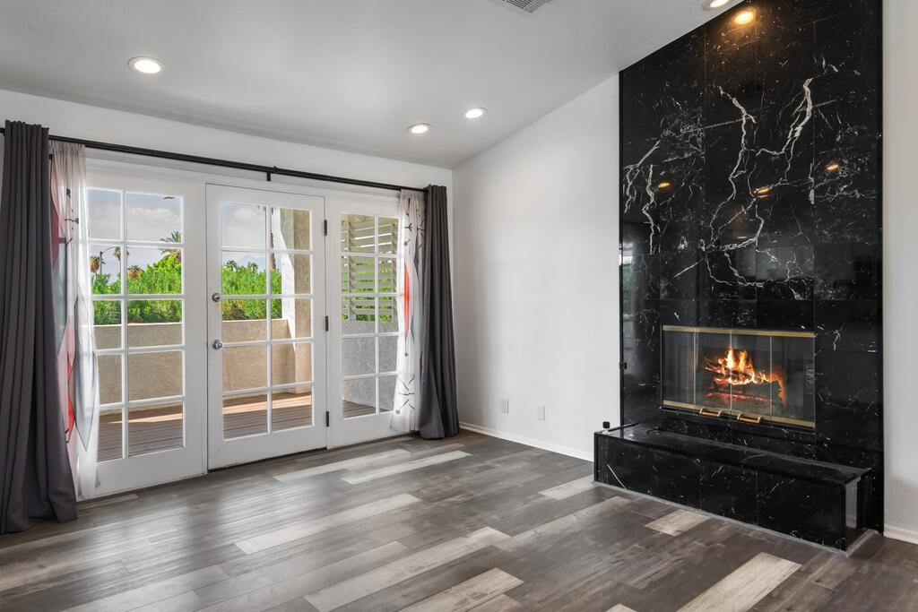 68515 Risueno Road Cathedral City, CA 92234 - Photo 6 of 29 a living room with furniture and a flat screen tv