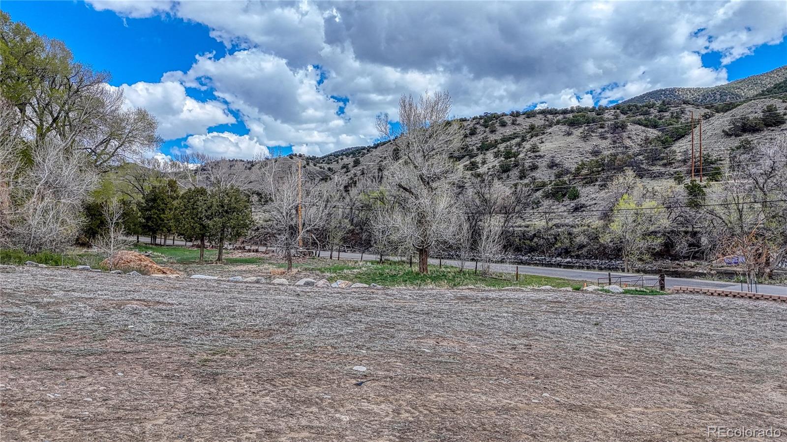 508 Old Stage Road Salida, CO 81201 - Photo 13 of 15 a backyard of a house with lots of green space