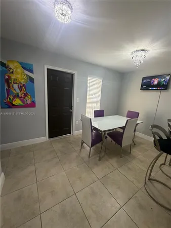 a view of a dining room with furniture