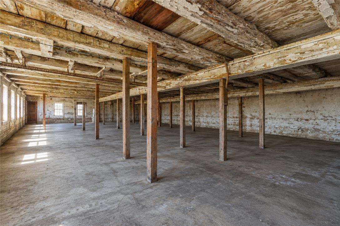 4682 Steuben Road Bethlehem, PA 18020 - Photo 55 of 84 An open, adaptable space with robust wooden beams and columns offers versatile potential for various uses.