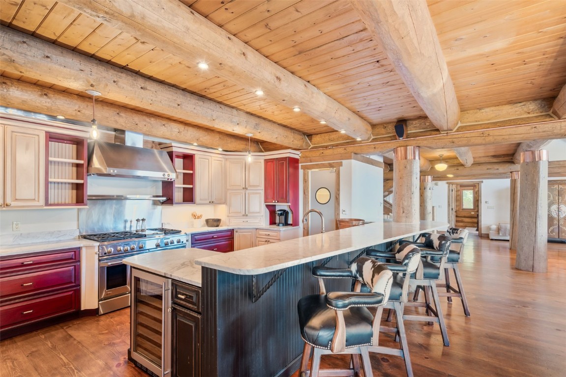 245 Easy Bend Trail Silverthorne, CO 80498 - Photo 14 of 45 a kitchen with a stove a sink and chairs