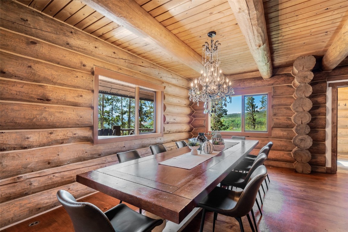 245 Easy Bend Trail Silverthorne, CO 80498 - Photo 16 of 45 a view of a dining room with furniture window and wooden floor