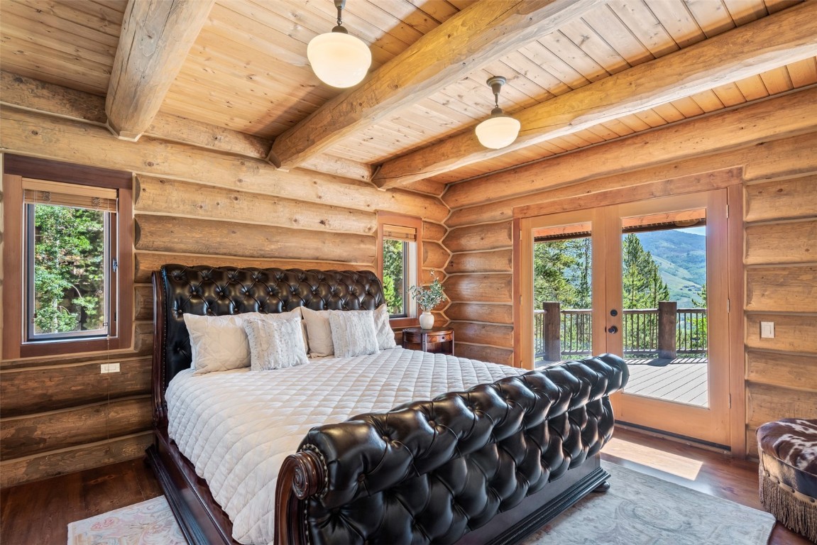 245 Easy Bend Trail Silverthorne, CO 80498 - Photo 17 of 45 a bed sitting in a bedroom next to a window