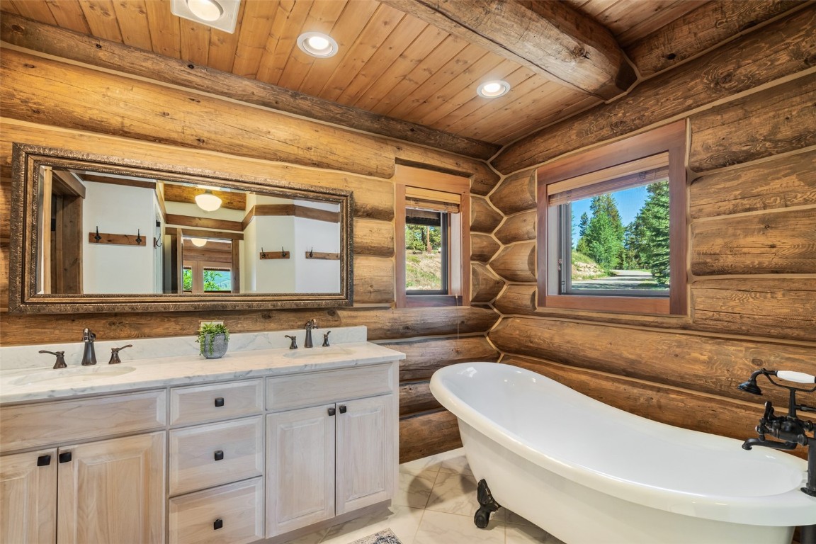 245 Easy Bend Trail Silverthorne, CO 80498 - Photo 19 of 45 a bathroom with a sink and a mirror