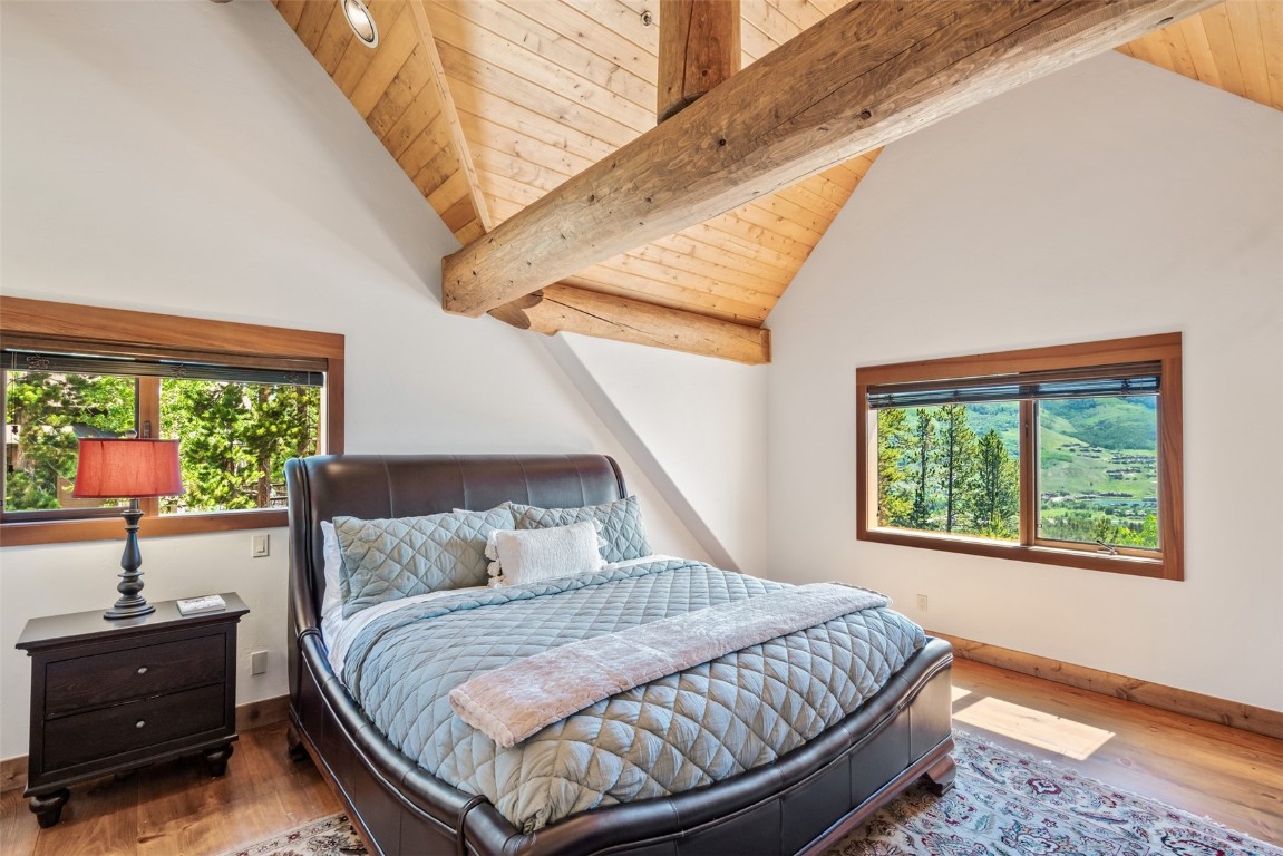 245 Easy Bend Trail Silverthorne, CO 80498 - Photo 21 of 45 a bedroom with a bed and a window