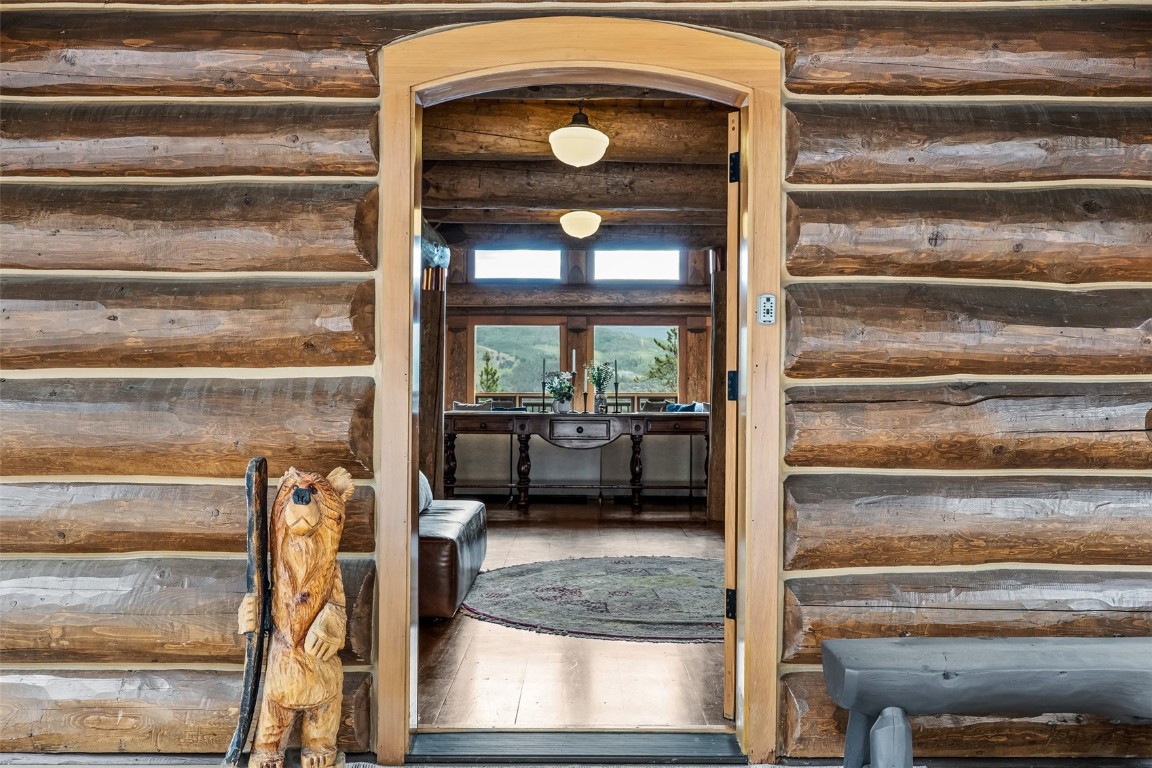 245 Easy Bend Trail Silverthorne, CO 80498 - Photo 40 of 45 a view of living room that has a couch and a bookshelf with wooden floor