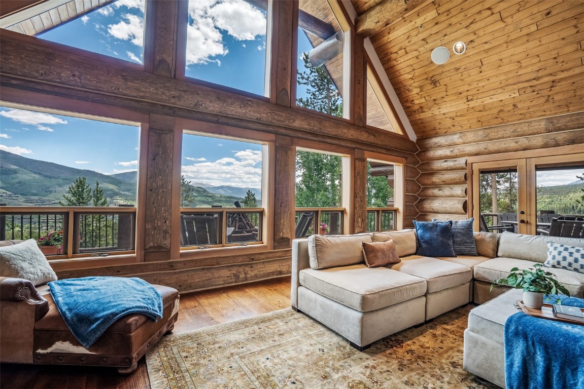 245 Easy Bend Trail Silverthorne, CO 80498 - Photo 9 of 45 a living room with furniture and a floor to ceiling window