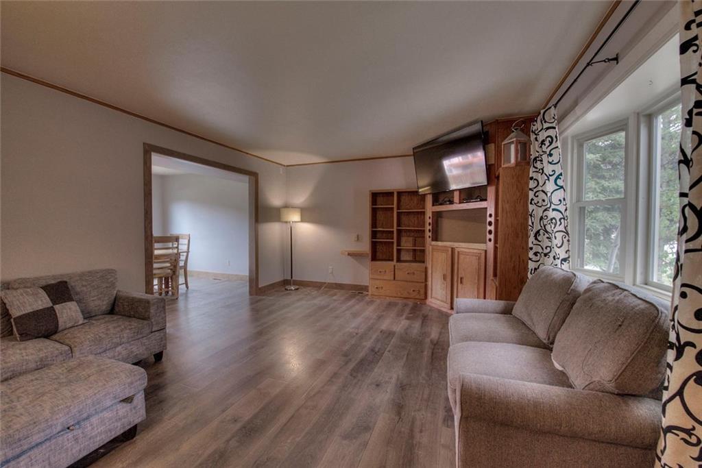 747 Deer Path Road Dillon, CO 80435 - Photo 2 of 29 a living room with furniture and a wooden floor