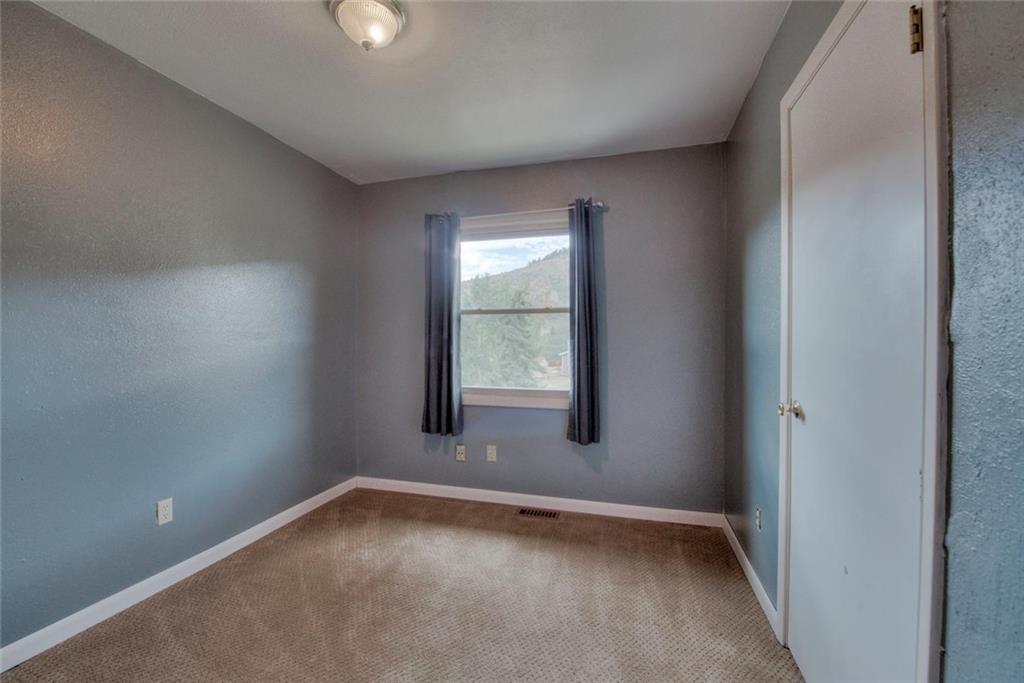 747 Deer Path Road Dillon, CO 80435 - Photo 11 of 29 a view of an empty room with a window