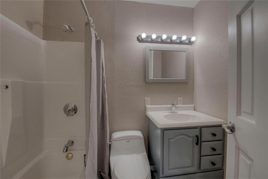 747 Deer Path Road Dillon, CO 80435 - Photo 13 of 29 a bathroom with a sink a toilet and shower
