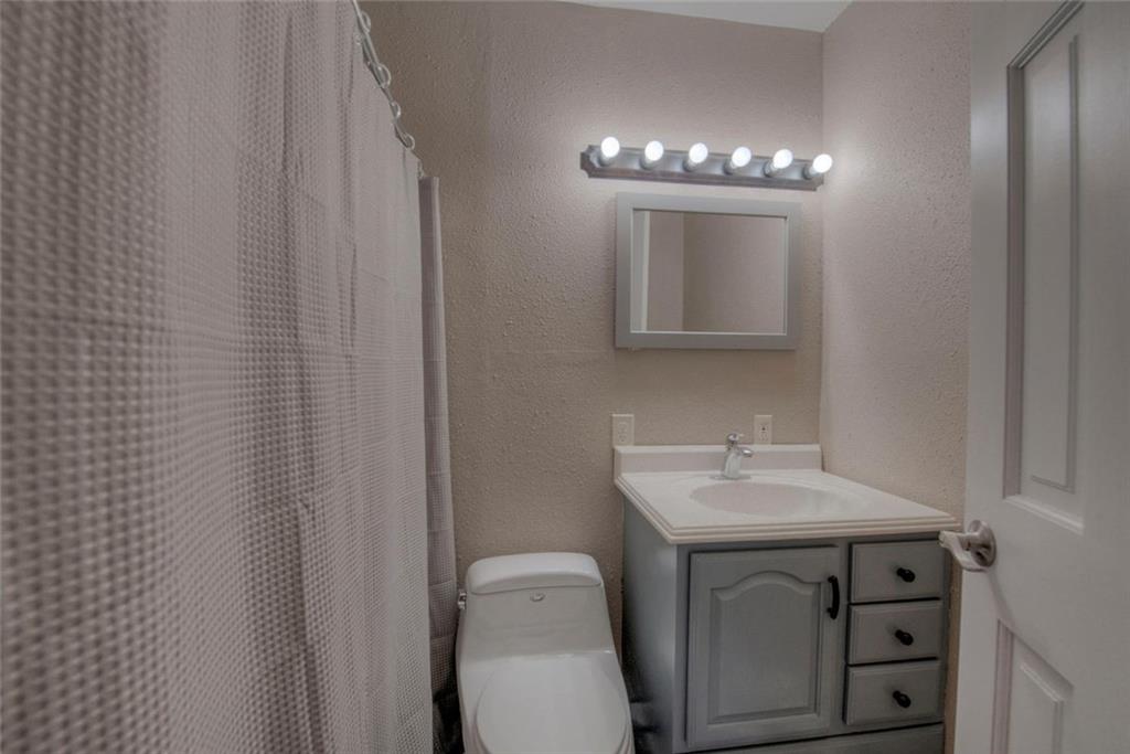 747 Deer Path Road Dillon, CO 80435 - Photo 14 of 29 a bathroom with a sink vanity and toilet
