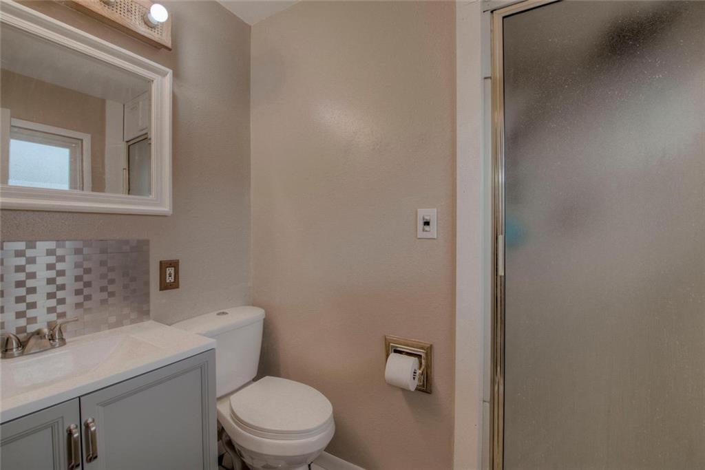 747 Deer Path Road Dillon, CO 80435 - Photo 18 of 29 a white toilet sitting next to a bathroom sink