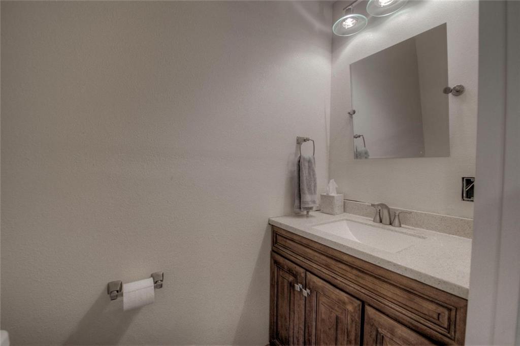 747 Deer Path Road Dillon, CO 80435 - Photo 25 of 29 a bathroom with a sink a vanity and a mirror