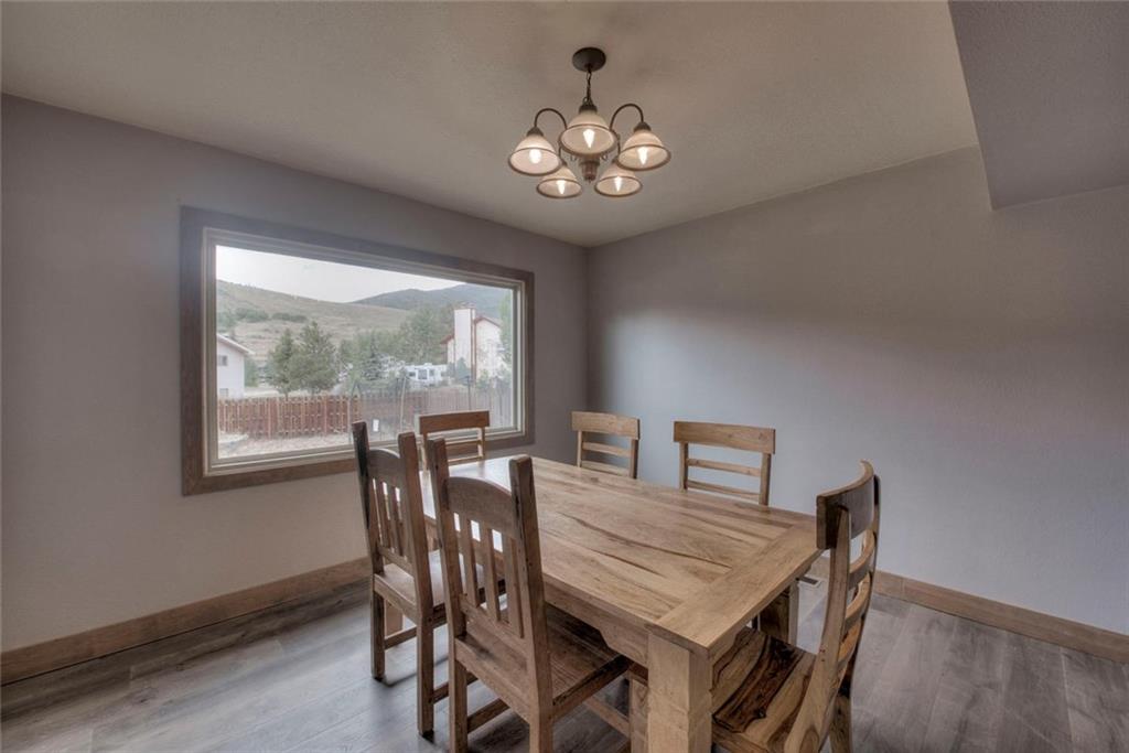 747 Deer Path Road Dillon, CO 80435 - Photo 4 of 29 a view of a dining room with furniture window and outside view