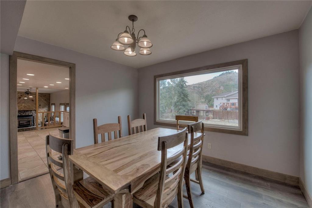 747 Deer Path Road Dillon, CO 80435 - Photo 5 of 29 a view of a dining room with furniture window and outside view