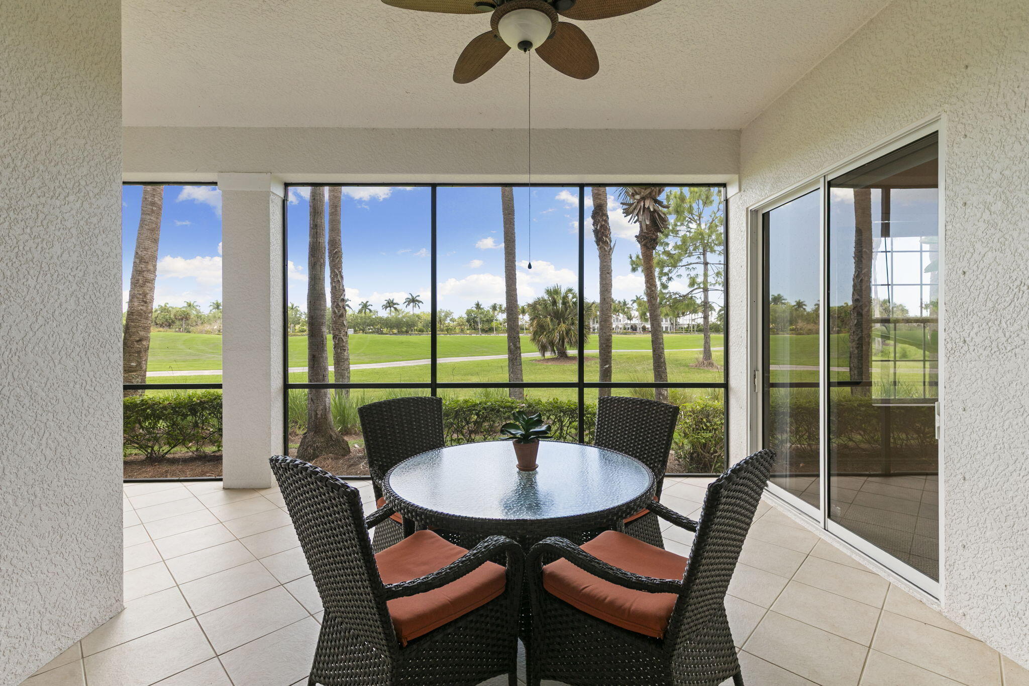 9066 Cascada Way, Unit 101 Naples, FL 34114 - Photo 26 of 51 a view of a dining room with furniture window and outside view