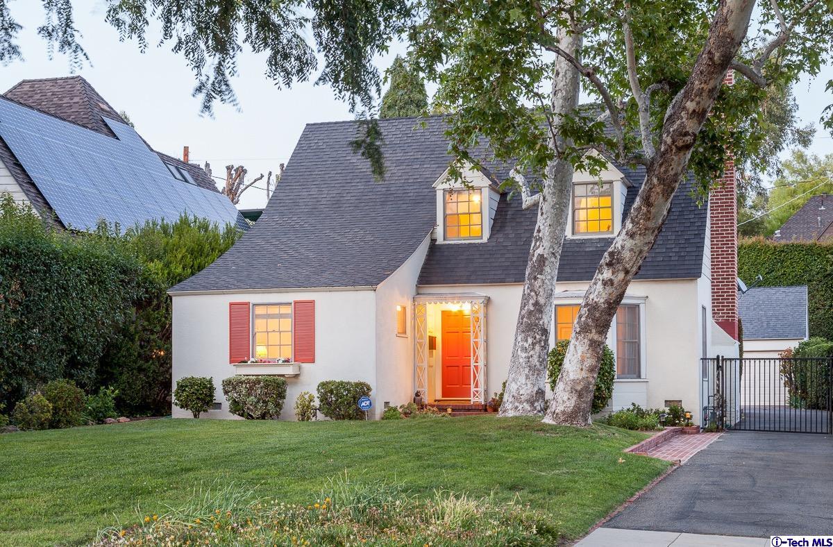 44 San Miguel Road Pasadena, CA 91105 - Photo 1 of 18 a front view of house with yard and trees in the background